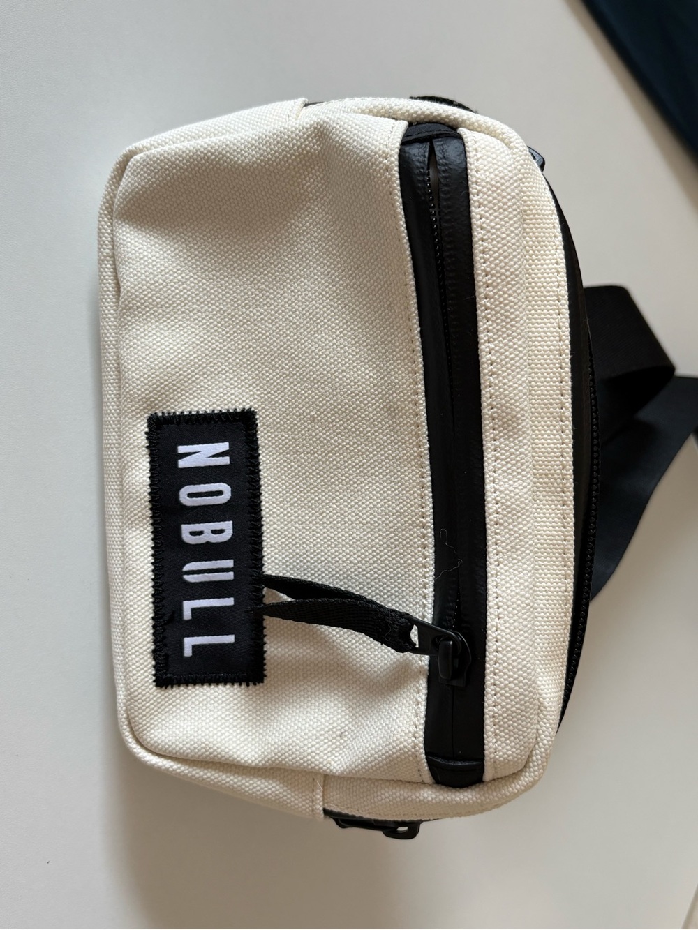 NOBULL Cream Canvas Belt Bag with Black Accents